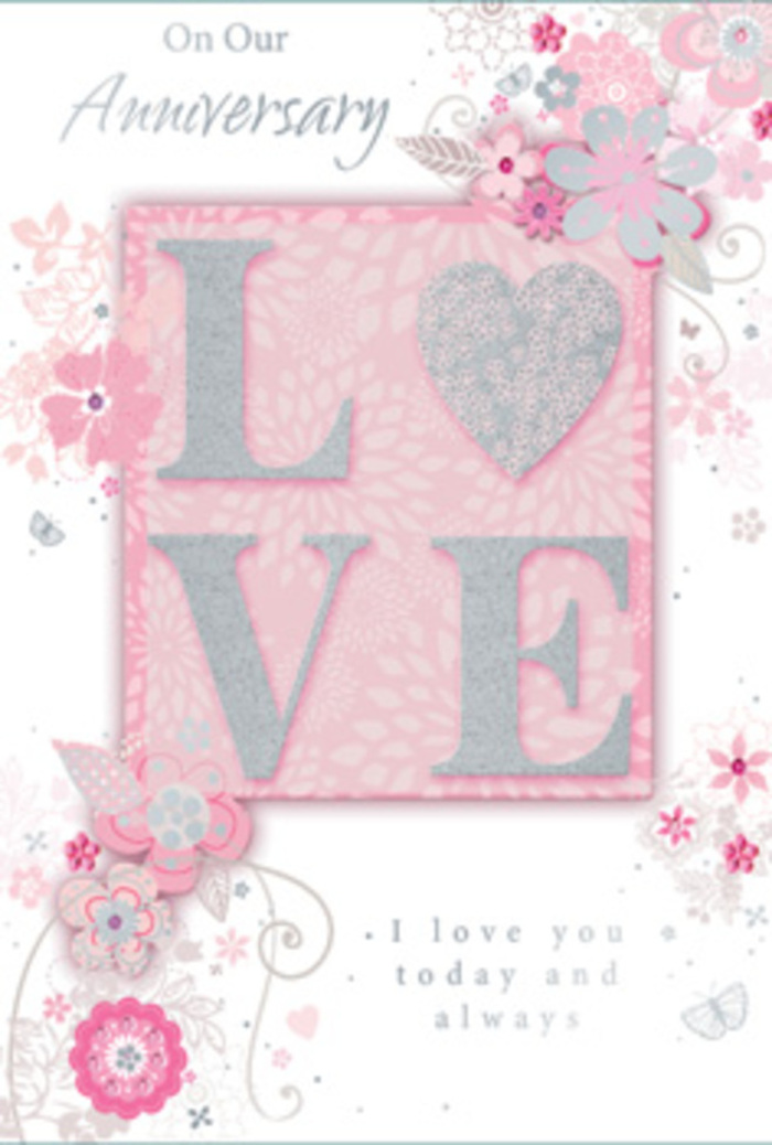 The anniversary card in this scene opens like a soft breath of light, reminiscent of stepping into a sunlit room on a calm morning in Lea Bridge. Dominating the centre is the word LOVE, each letter formed in a raised print and dusted with a frosted, fine glitter that glistens gently when it catches the light. The texture is clearly tactile, designed to be felt as well as seen, echoing the sense of closeness and touch that defines a long-standing relationship. Around this central word, wispy, hand-drawn flowers and trailing sprays drift along the borders, much like the airy, romantic bouquets a local Lea Bridge florist might design for anniversaries and vow renewals. The petals are shaded in soft blush pink, lilac, and creamy ivory, with subtle grey outlines adding definition without harshness. These blooms seem to float over a pale, rosy background, lending the whole composition a dreamy, weightless quality. Fine filigree lines, dainty leaves, and almost-hidden butterflies weave between the flowers, their delicate shapes suggesting the flutter of hearts and the quiet excitement of celebrating another year together. An understated yet heartfelt message-such as I love you today and always-is nestled in graceful type beneath or alongside the floral frame, its simple wording balancing the ornamentation around it. The card feels composed with the same care used when tying a bespoke bouquet for a couple living off Lea Bridge Road or near Millfields Park: thoughtful, balanced, and deeply personal. It is less a simple greeting and more a keepsake, a paper bouquet of affection designed to be treasured long after the anniversary day has passed.